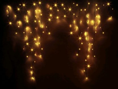 200 Электрогирлянда уличная "Сосульки" 104 тепл бел LED огня пост свеч зел провод 14 нитей 2,3м (отдел елочная игрушка, подвеска на елку)